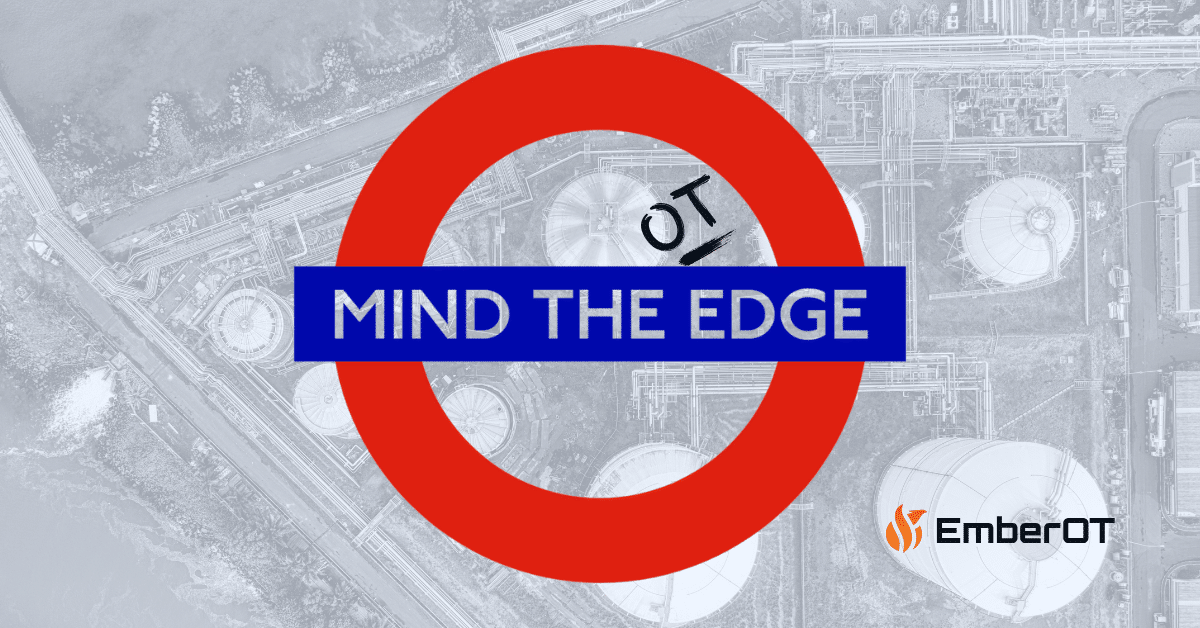 **Alt Text Description:** A graphic styled like the iconic London Underground "Mind the Gap" sign, featuring a large red circle with a blue bar across the center that reads “MIND THE EDGE” in silver letters. Above the text, the word “OT” is handwritten diagonally, replacing "Gap" with a cybersecurity reference. The background is a grayscale aerial view of an industrial facility with tanks and pipelines. The EmberOT flame logo and brand name appear in the bottom-right corner.